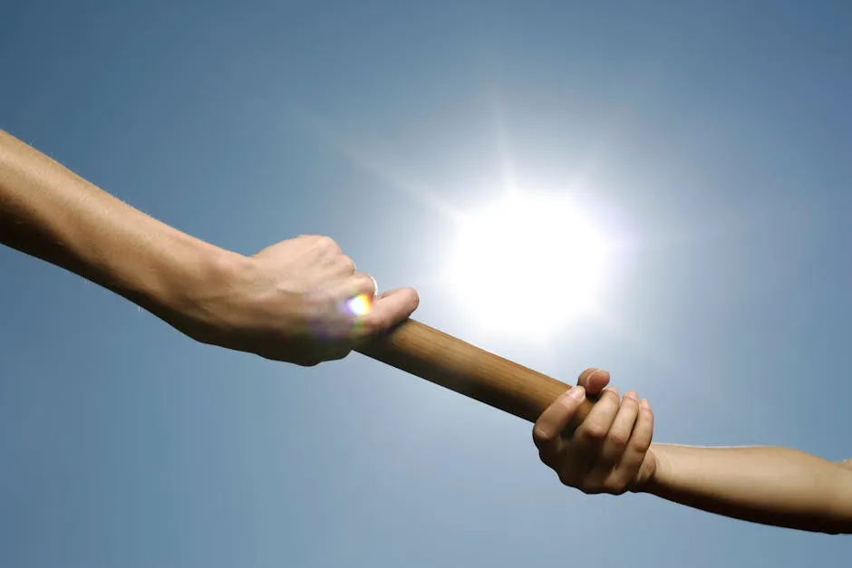 A relay race baton passing from one runner's hand to another, suggesting knowledge handed off rather than stored
