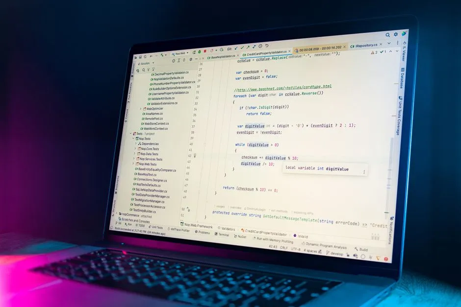 A laptop showing plain-text Markdown source beside a rendered document page