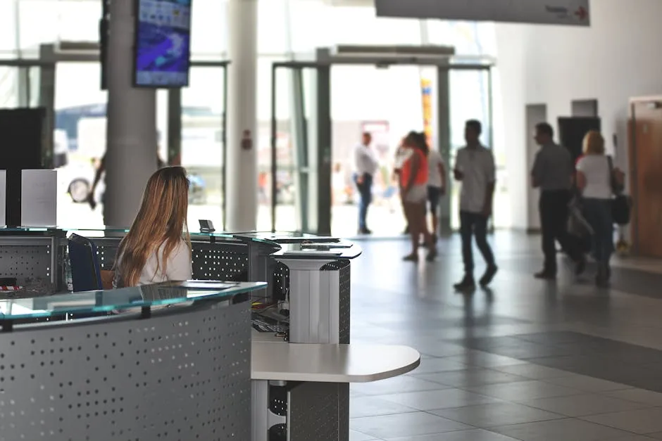 A bright modern office lobby with a reception desk and seating, suggesting the central internal hub an intranet is meant to be